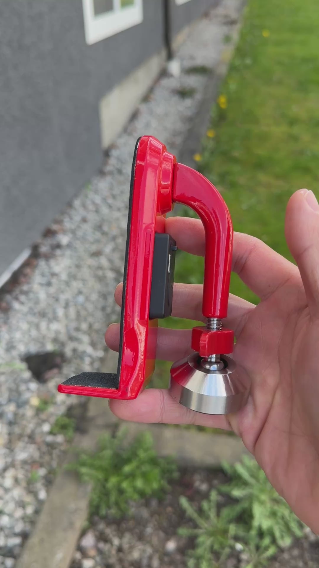 Compact portable door jammer alarm device for travel, designed to block doors and trigger loud alarm when forced open
